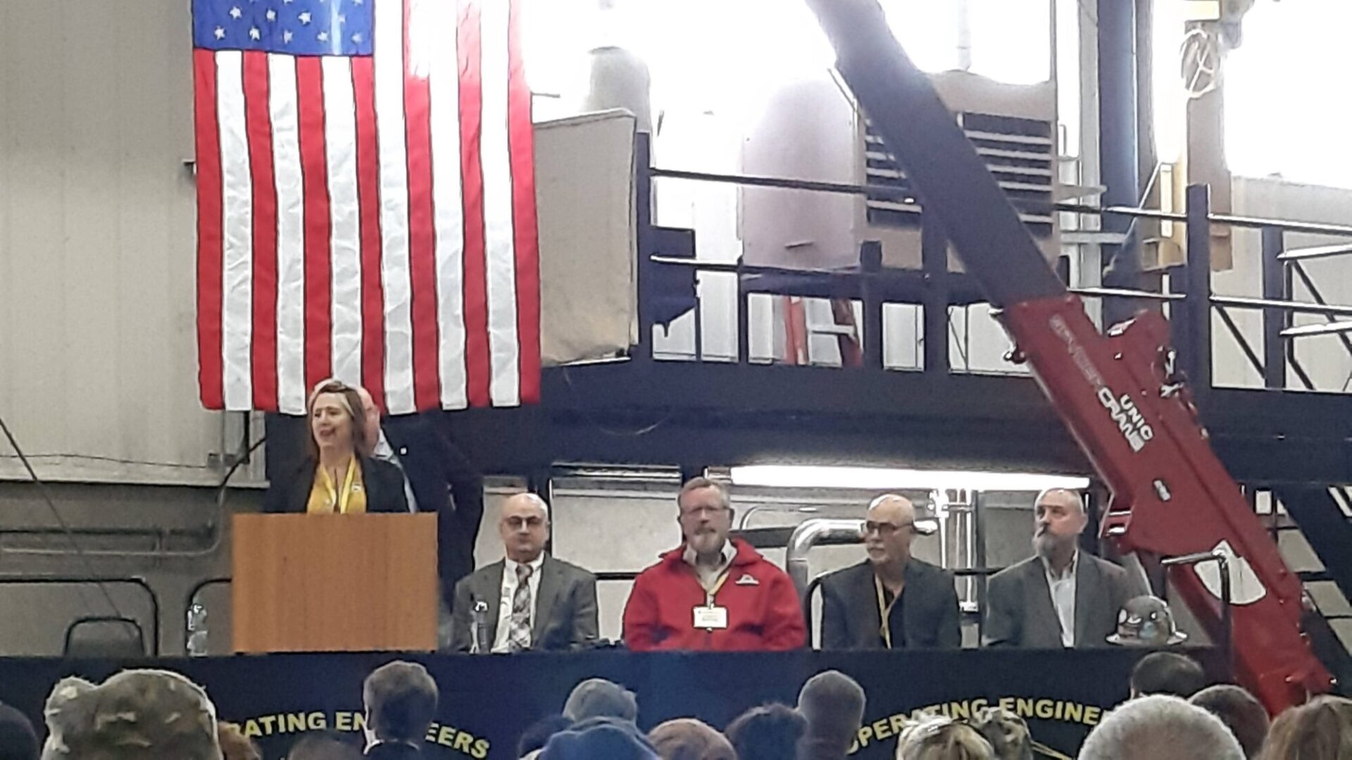 director speaking at the event